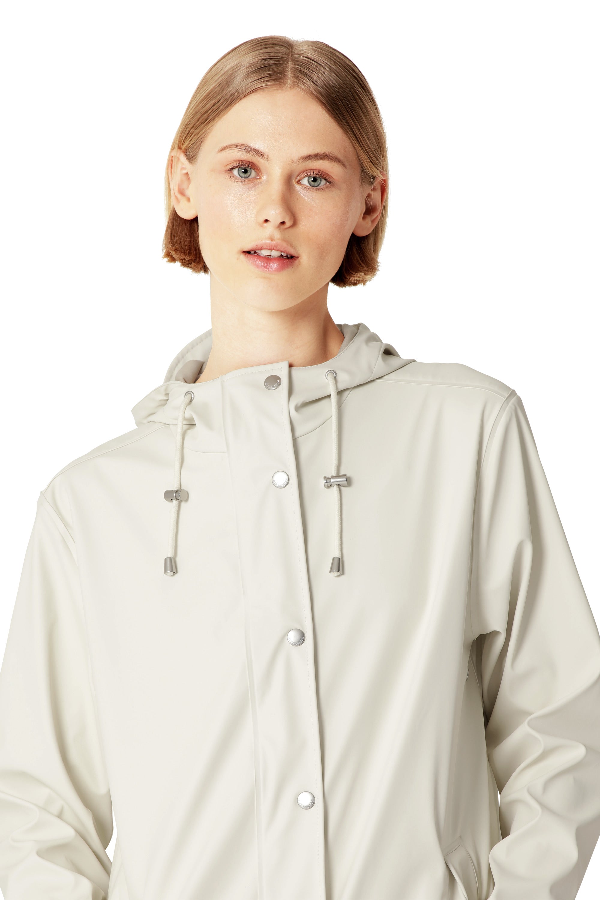 Close-up of a light cream Ilse Jacobsen Long Waterproof Snap Hood Coat outerwear with drawstring hood details