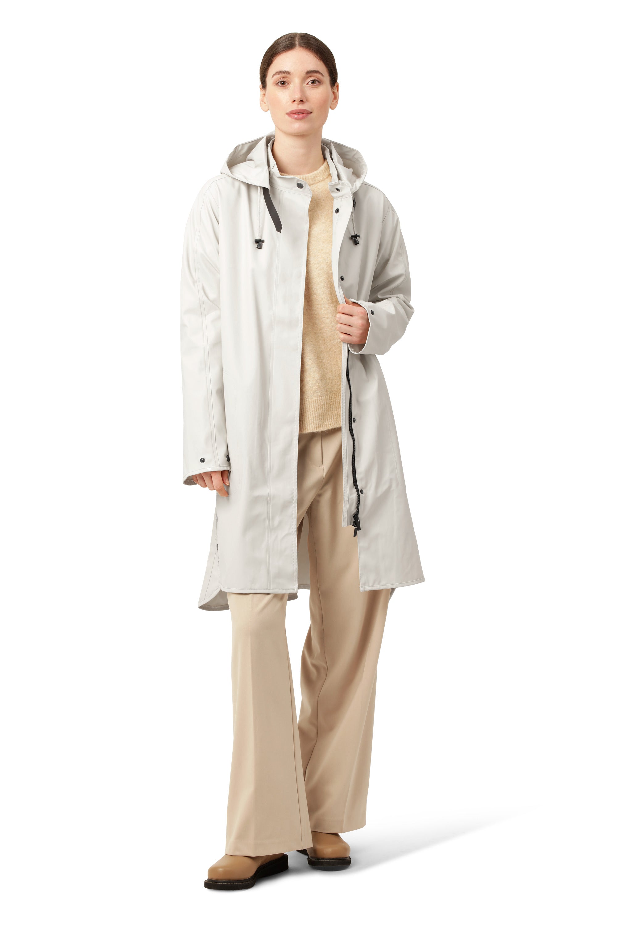 Ilse Jacobsen Waterproof Snap Hood Rain Jacket in cream, styled with beige pants and tan shoes, lightweight outerwear design