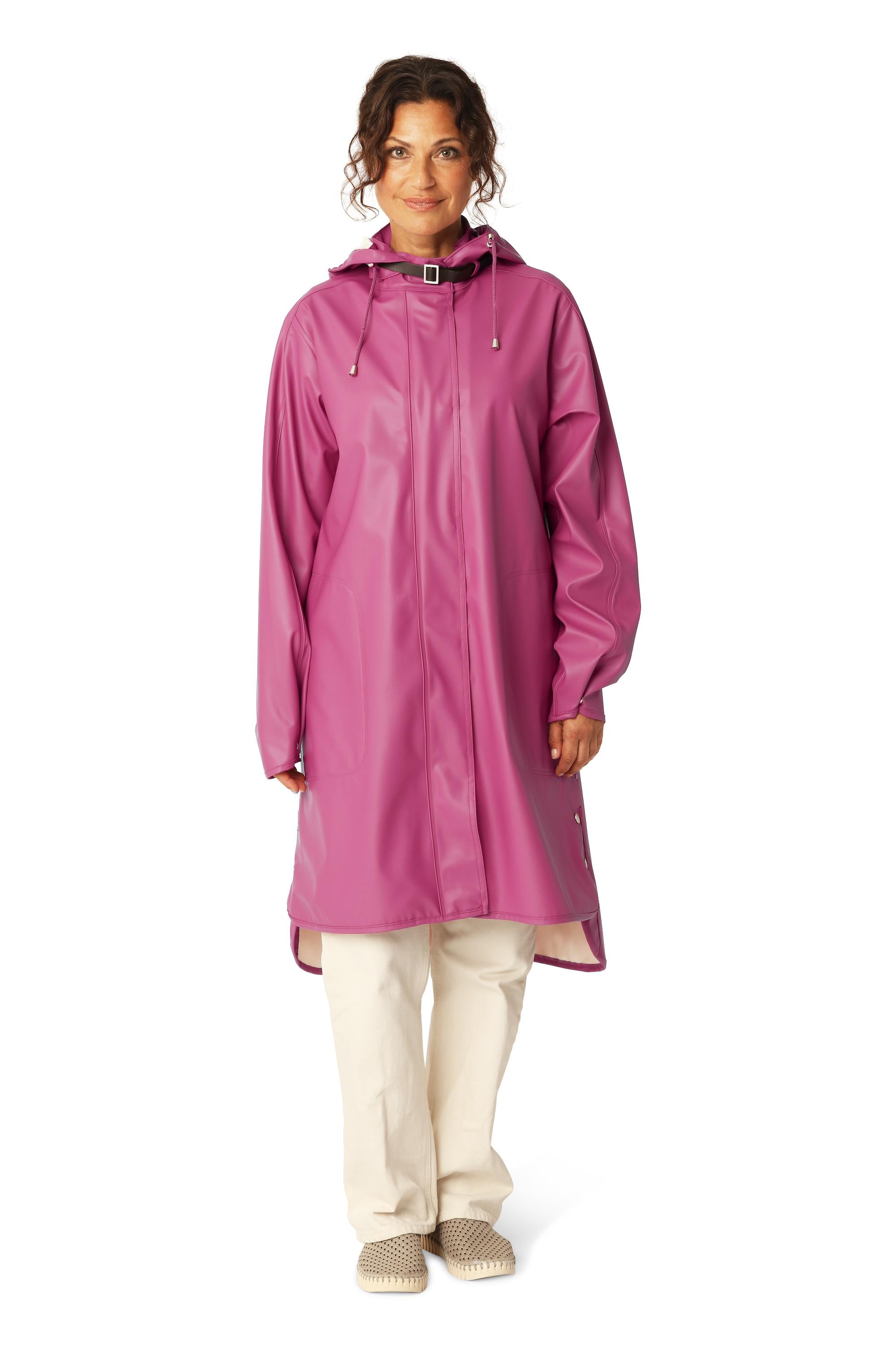 Ilse Jacobsen Waterproof Snap Hood Rain Jacket in magenta outerwear styled with light pants and casual shoes