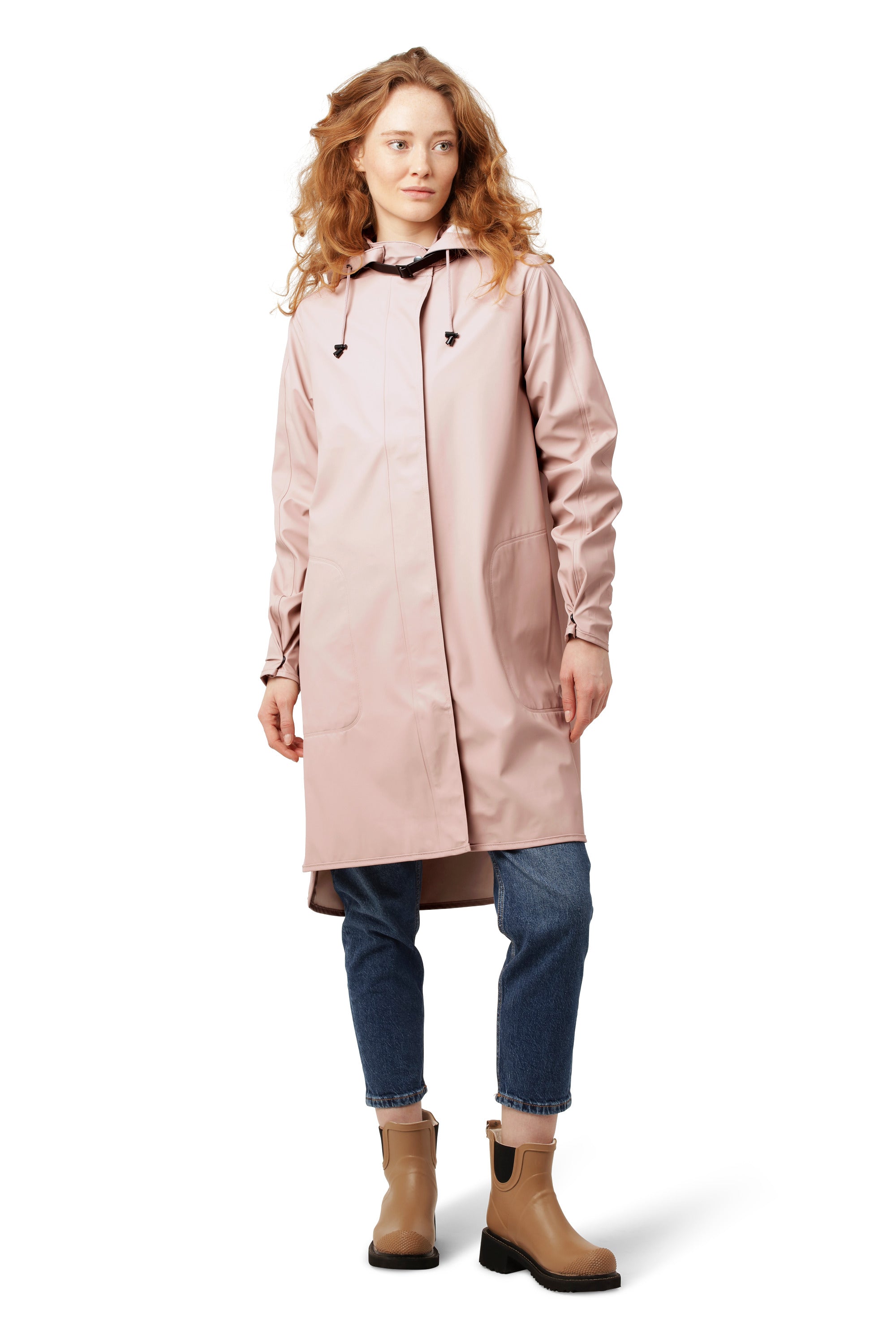 Light pink Ilse Jacobsen Waterproof Snap Hood Rain Jacket worn over jeans with tan ankle boots by Ilse Jacobsen