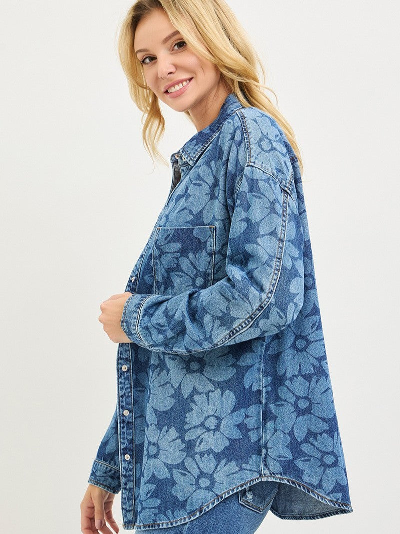 Retro Floral Denim Button-Up Shirt by Risen in blue with floral pattern, featuring front pockets and button closure.