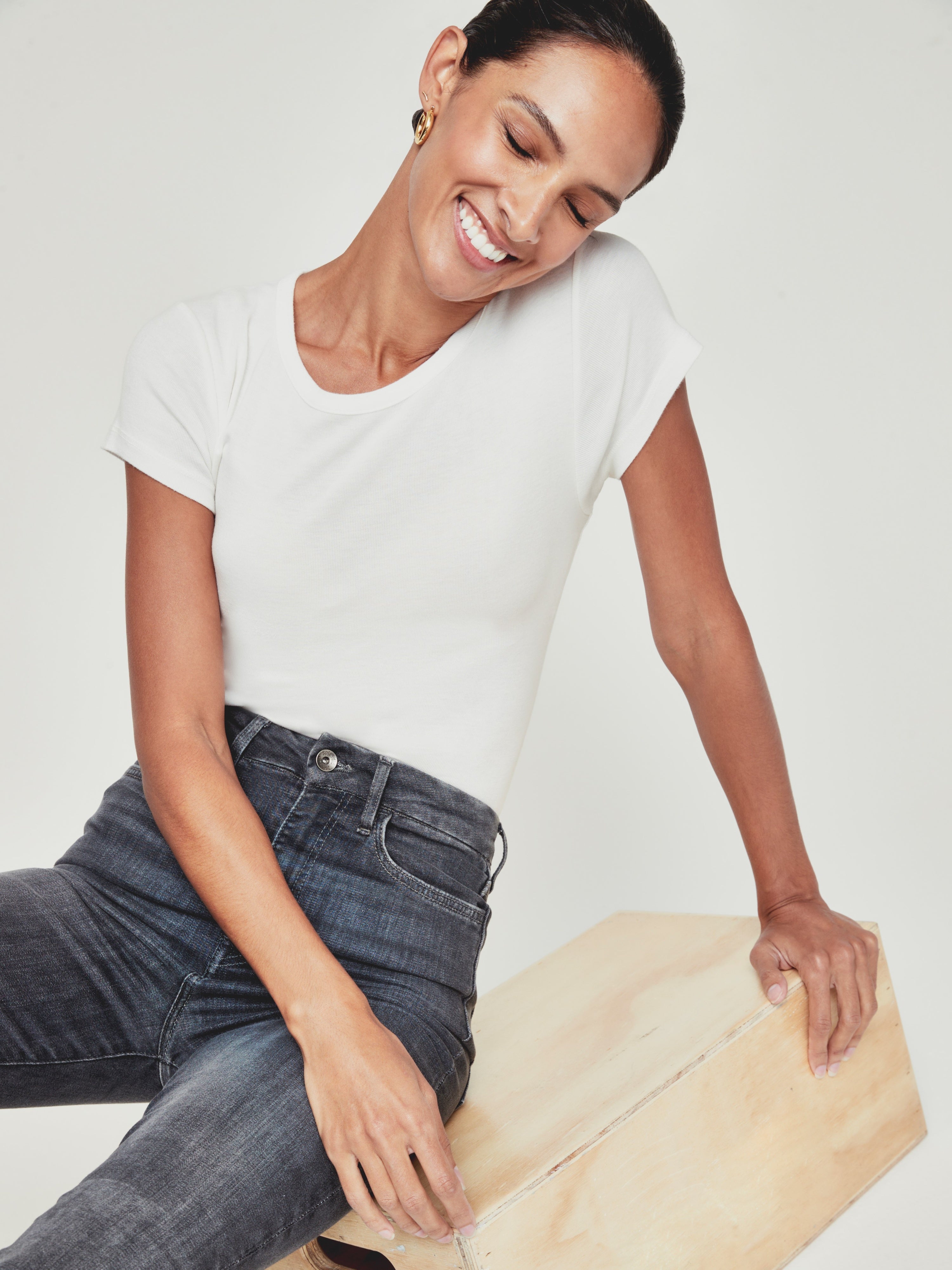 Splendid Abbie Relaxed Crew Neck Everyday Tee in white paired with dark denim jeans, styled casually with gold hoop earrings