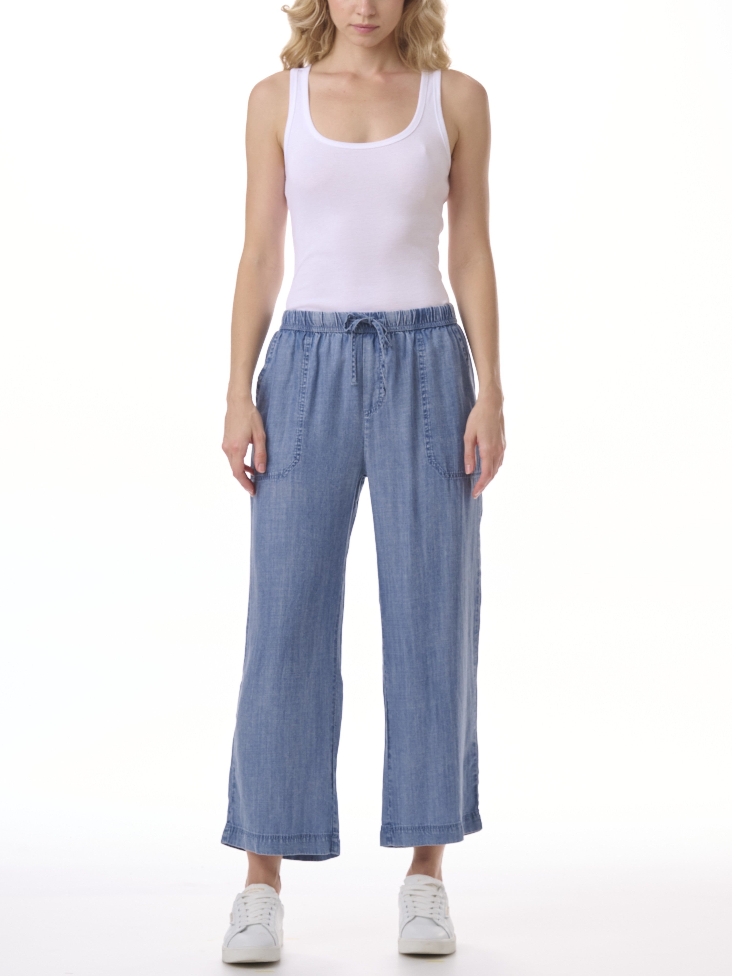 Splendid Angie Cropped Wide Leg Denim Pants in light indigo denim by Splendid styled with white tank and sneakers.