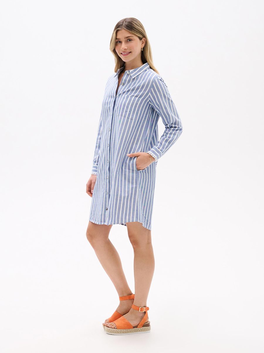 Hatley Julia Long Sleeve Shirt Dress in blue and white stripes by Hatley, styled with orange sandals and pockets.