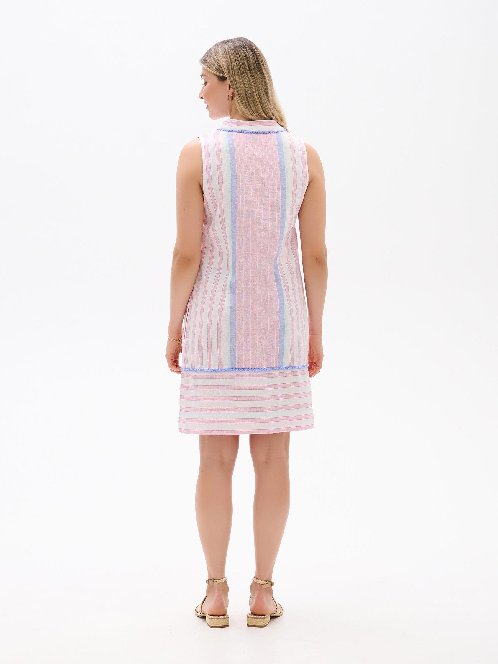 Back view of Hatley Marin Dress in soft pink, blue, and white stripes by Hatley on a model against white background