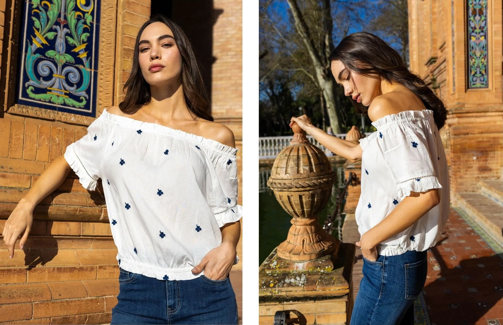 White off-shoulder blouse with small dark floral patterns paired with blue denim jeans outdoors by brick architecture.