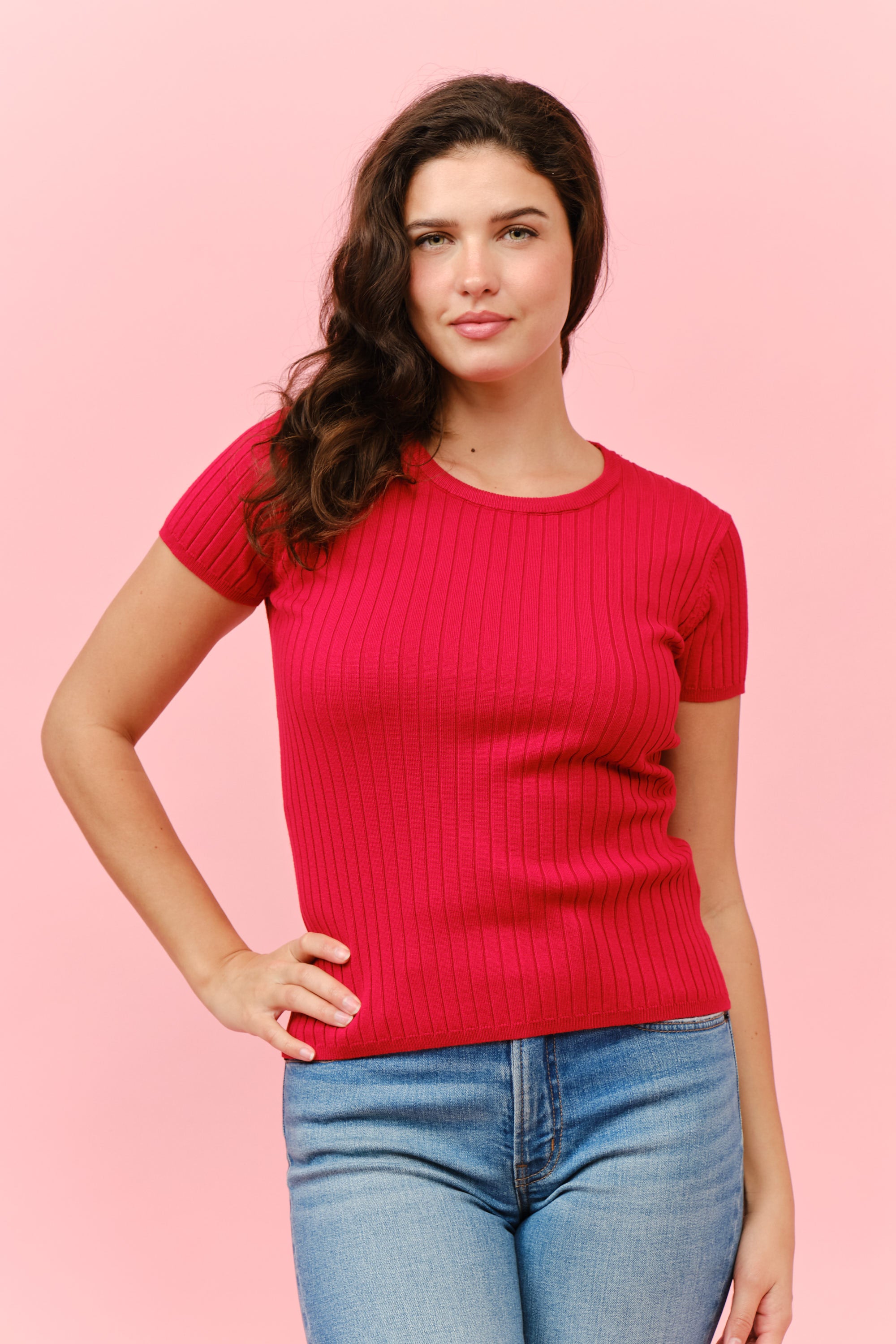 Red ribbed knit short sleeve top Cielo Wide Rib & Fit Short Sleeve Knit Top by Cielo 1985 Inc. paired with blue jeans