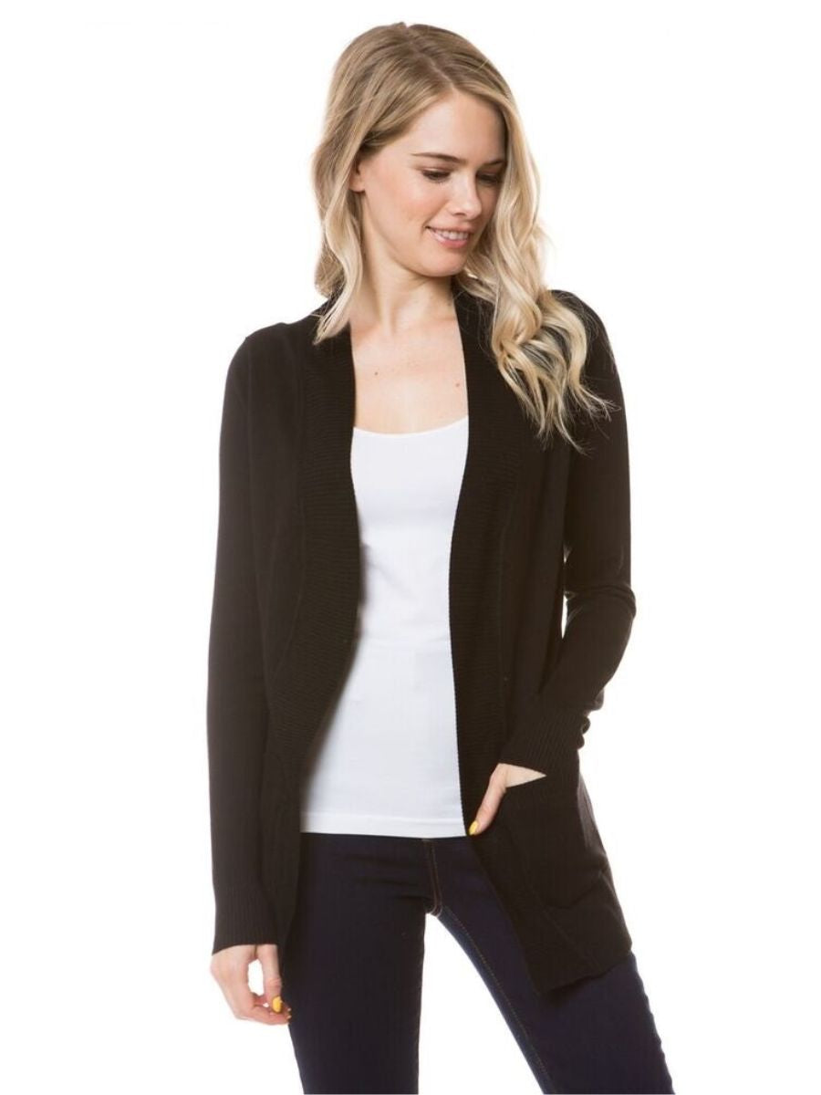 Cielo Simon Open Pocket Cardigan in black by Cielo 1985 Inc., styled with a white top and dark jeans, cozy sweater outerwear.