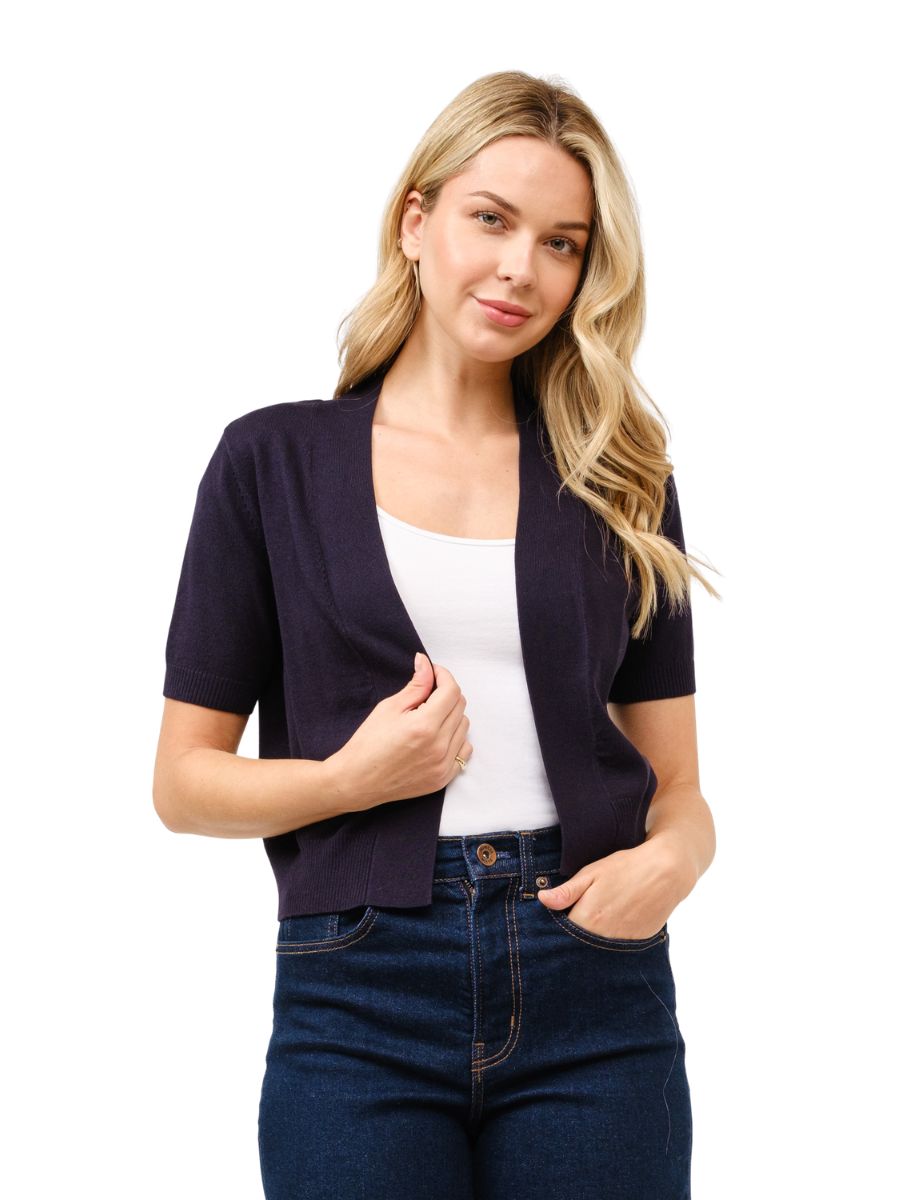 Cielo Short Sleeve Open Bolero Cardigan in navy blue by Cielo 1985 Inc., styled as a lightweight outerwear top.