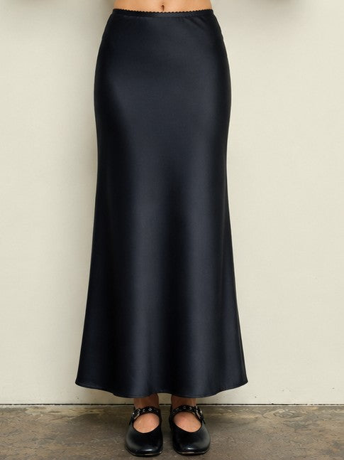 Soleil Maxi Satin Skirt by Mine in black with a sleek satin finish and flowing maxi length