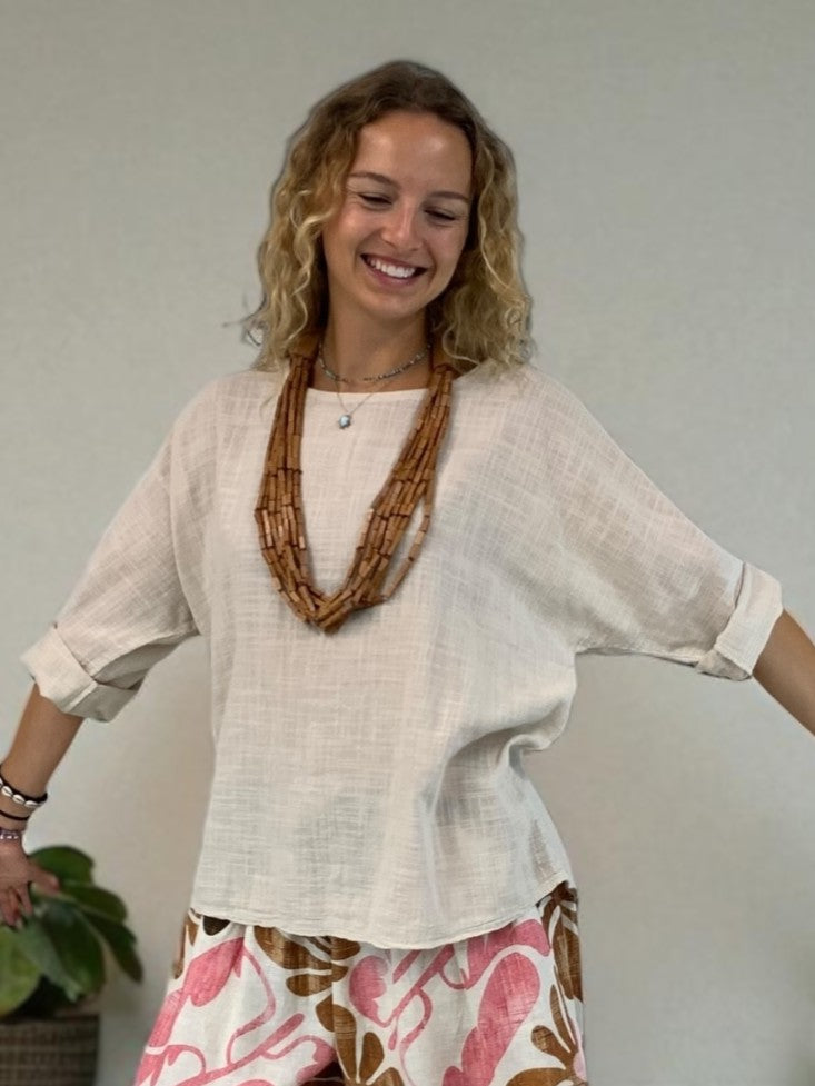 Simple Cotton Gauze 3/4 Sleeve Lightweight Top by Plum Loco in a soft sand color with textured fabric and rolled cuffs