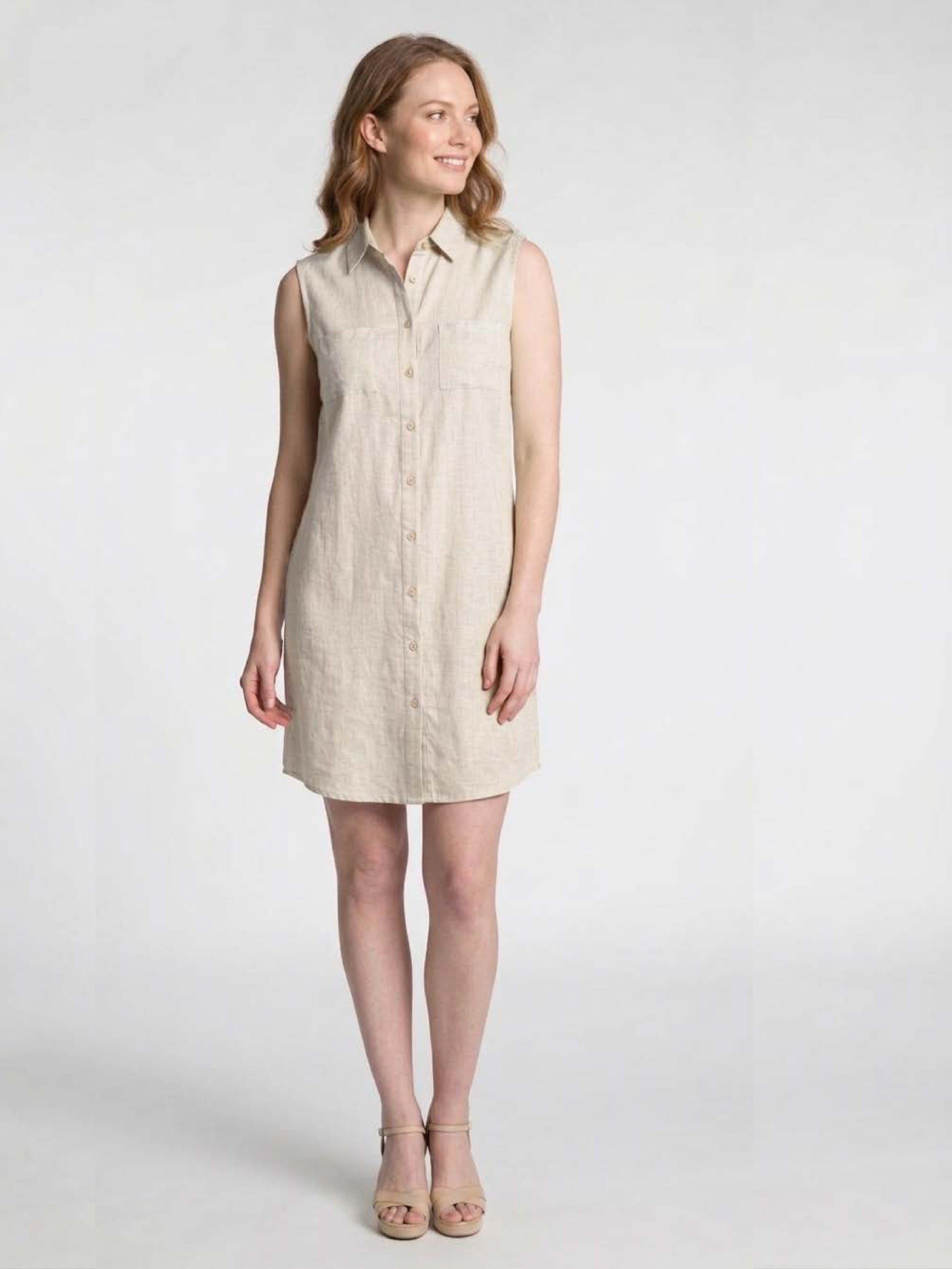 Sleeveless natural linen blend Button Front Linen Blend Pocket Shirt Dress from DKR & Co. Apparel with front pockets and collar.