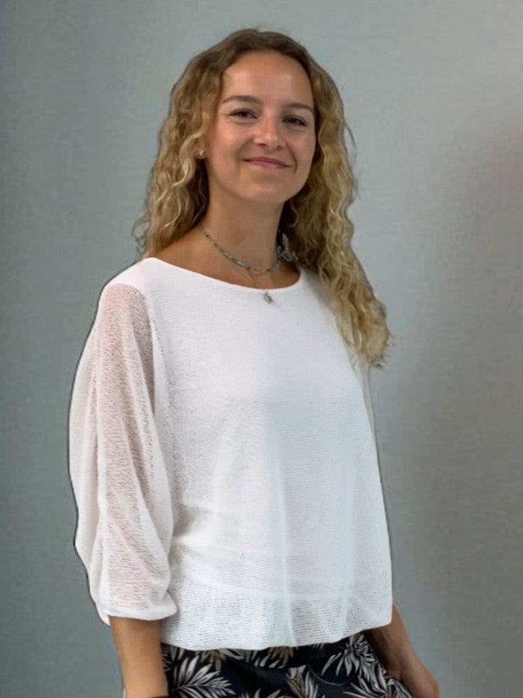 Bubble Hem Dolman Sleeve Oversized Blouse by Plum Loco in white with sheer dolman sleeves and relaxed fit top