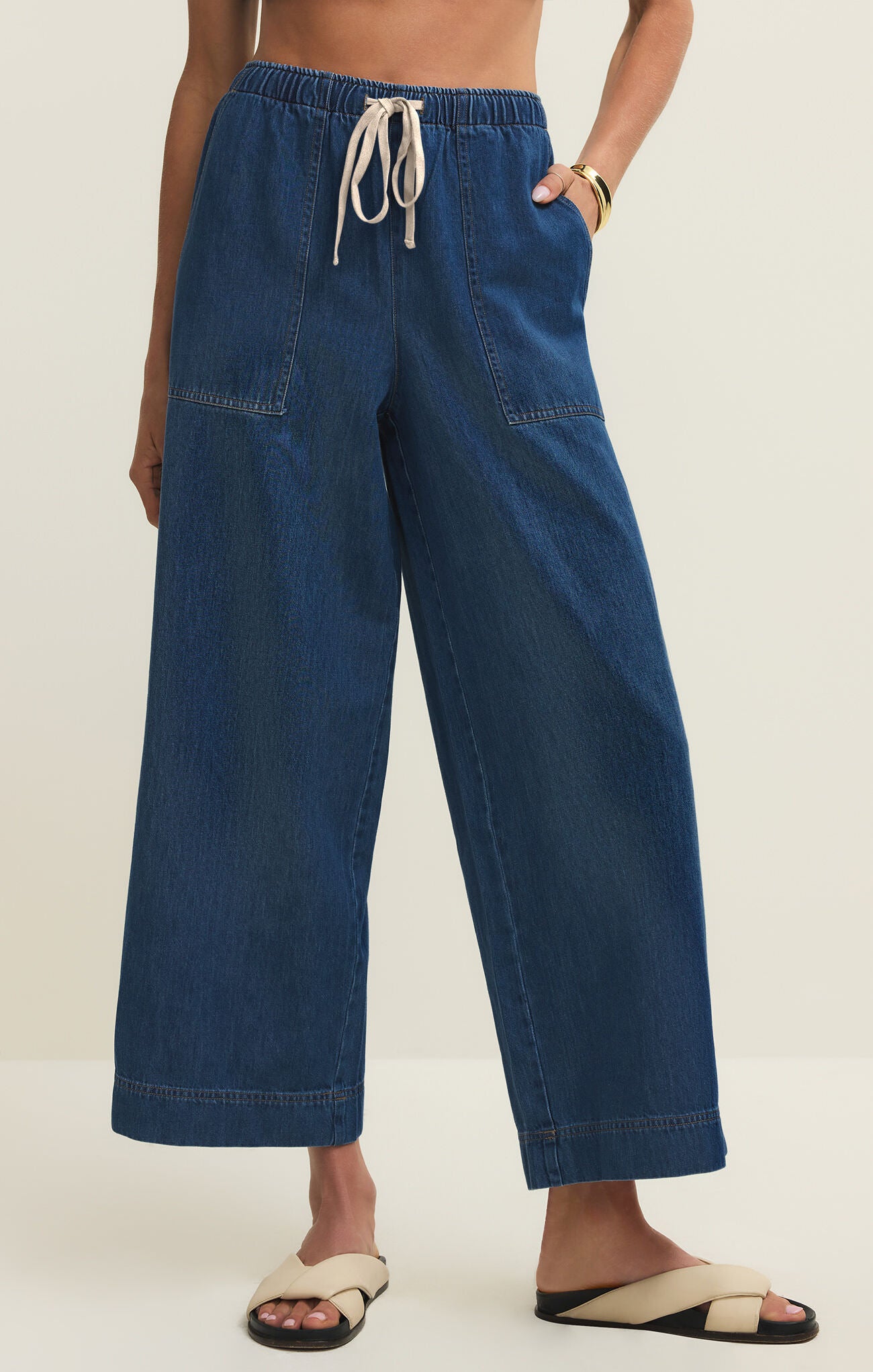 Z Supply Daycation Jersey Utility Pant in dark denim with wide legs, elastic waist, and front patch pockets