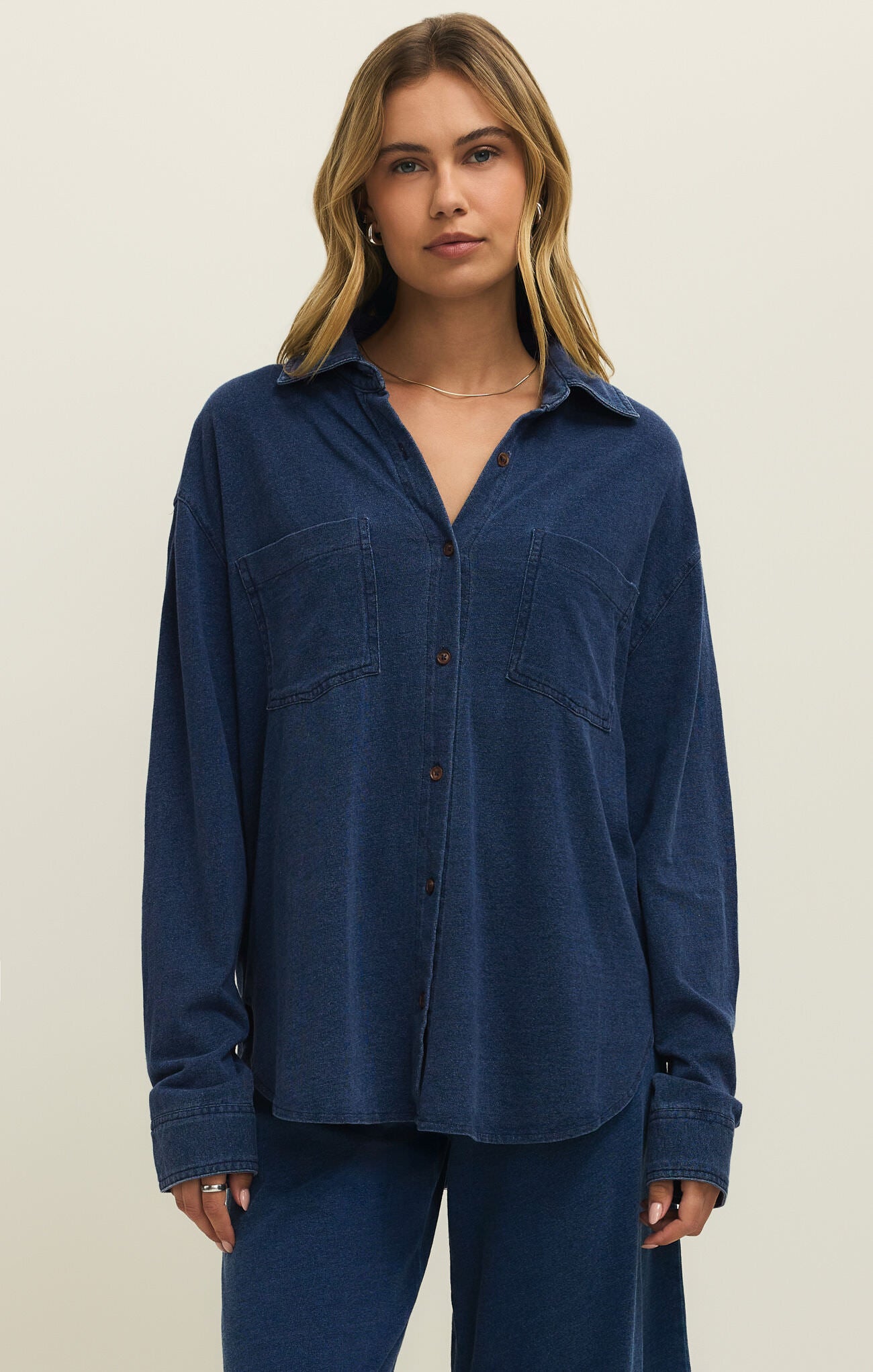 Z Supply Reese Long Sleeve Jersey Button Up in dark blue, a relaxed fit top with button front and chest pockets by Z Supply.